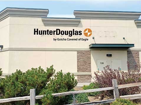 Store exterior with the Hunter Douglas logo